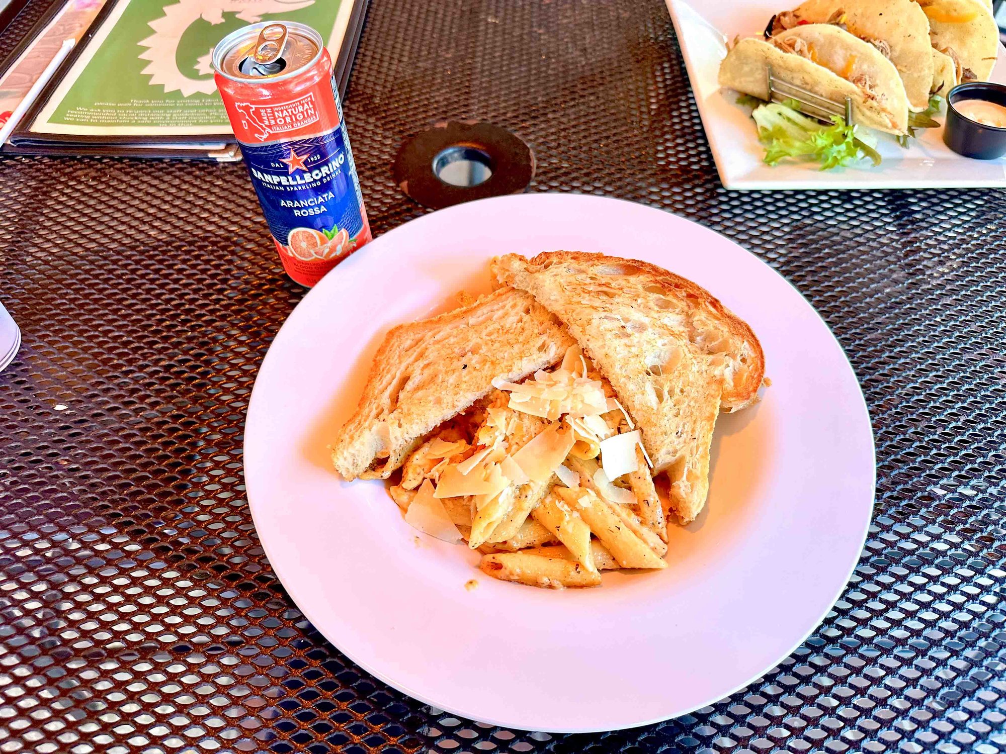 Grilled chicken melt on table